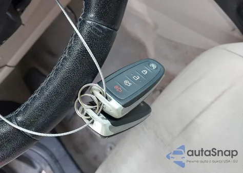 2015 Ford Escape Titanium z USA, uszkodzony, nr VIN 1FMCU9J90FUA08230